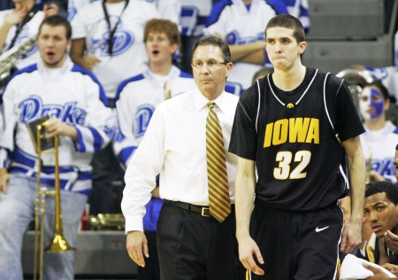 Iowa head coach Todd Lickliter sends Jake Kelly (32) into the game during the first half at Drake's Knapp Center in Des Moines on Dec. 20, 2008. Iowa lost 60-43.