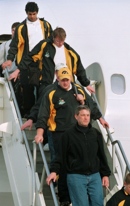 Members of the Iowa football team arrive at the Eastern Iowa Airport on Jan. 2, 2005. Iowa beat Louisiana State in the Capital One Bowl on Jan. 1, 2005.